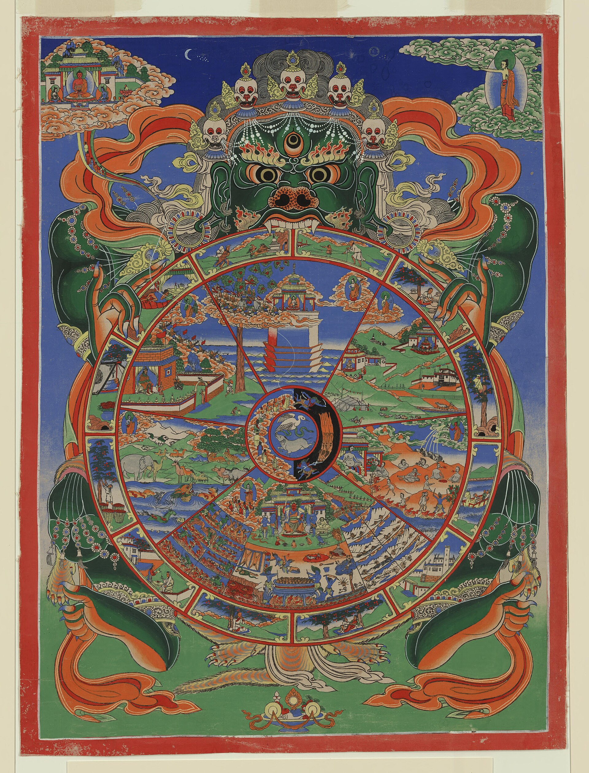Yama holds the Tibetan Buddhist Wheel of Becoming, whose nested realms portray action, habit, death, and rebirth as one continuous circuit.