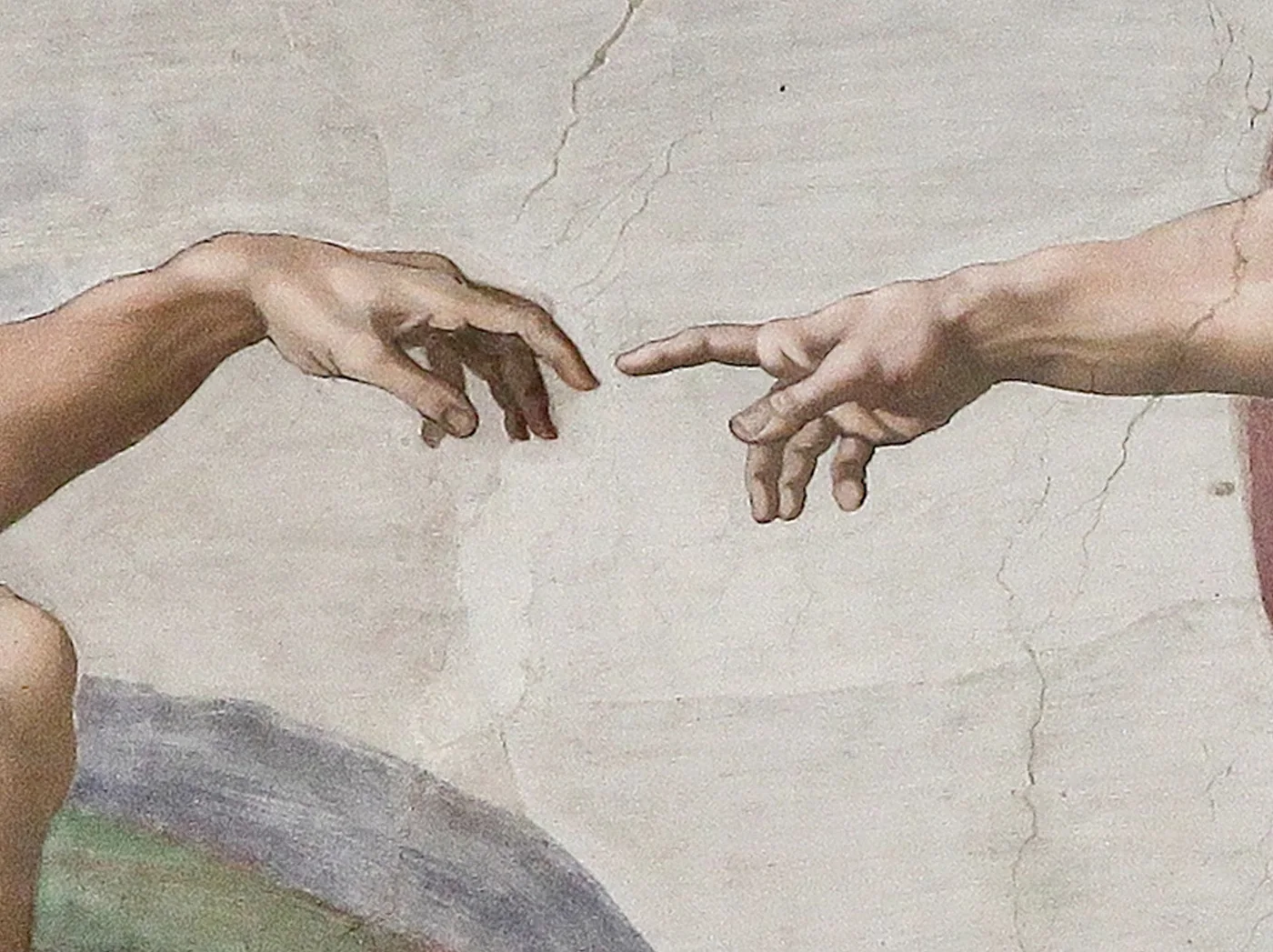 The hands of God and Adam extend toward one another across a narrow interval.